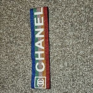 Glitzy Bella hat @Chanel hat band. New unworn. Hat is not included